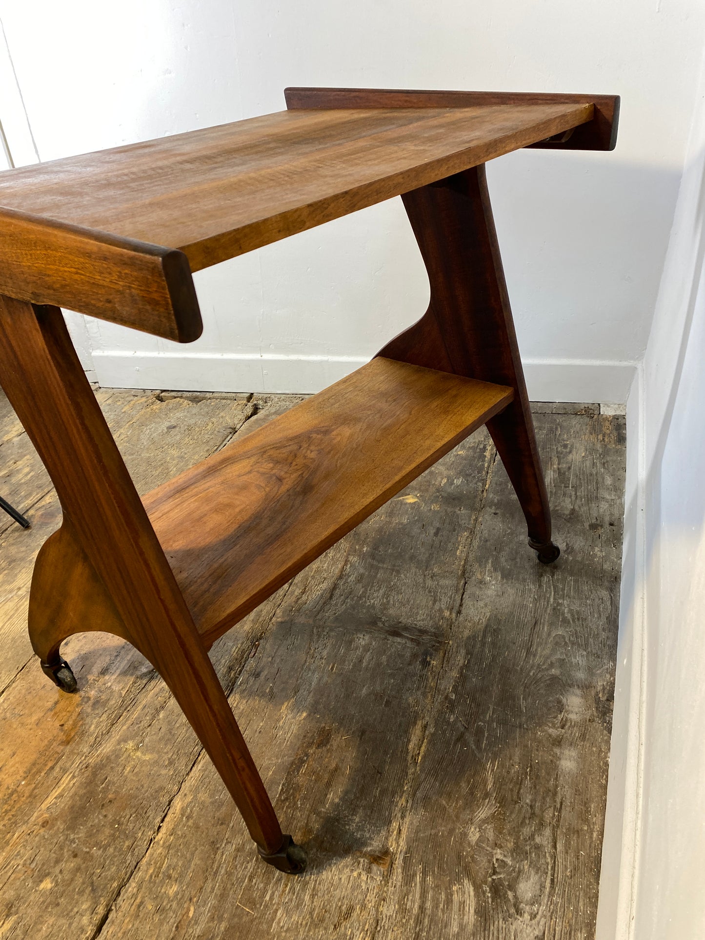 Vintage 1950s Mid-Century Modern Side Table on Casters – Sculptural Solid Wood Design
