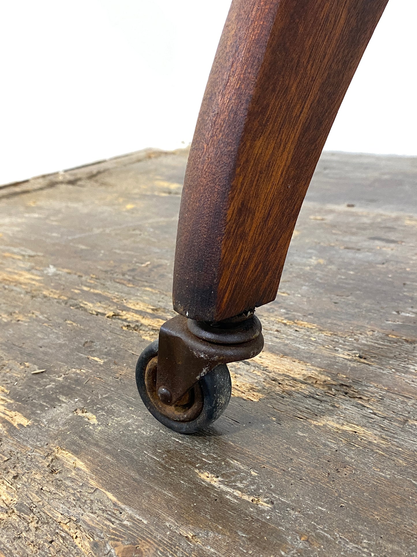 Vintage 1950s Mid-Century Modern Side Table on Casters – Sculptural Solid Wood Design