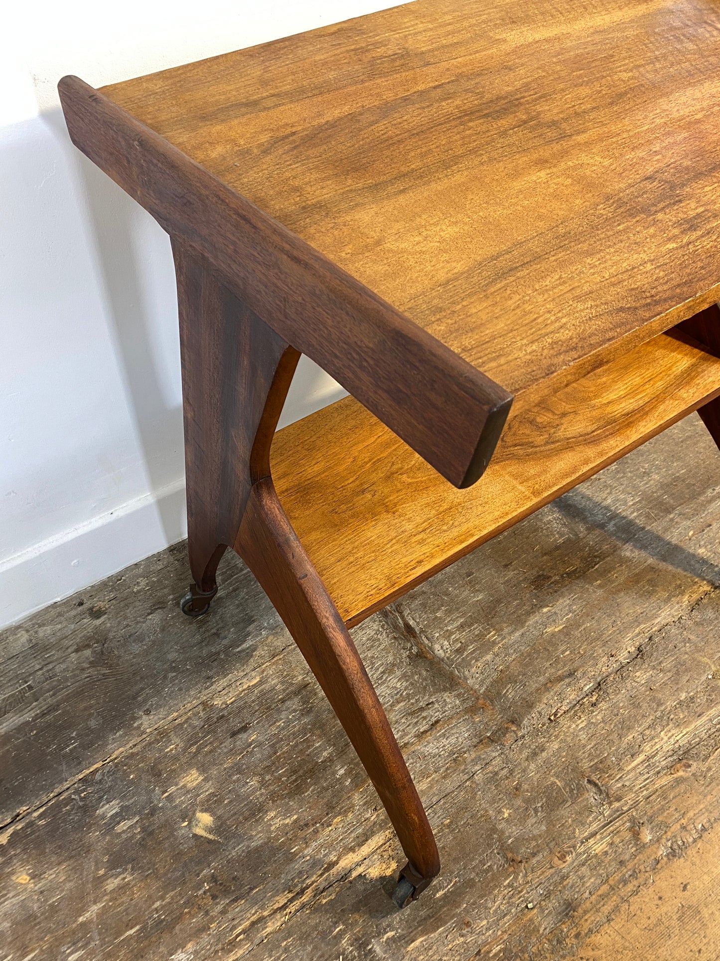 Vintage 1950s Mid-Century Modern Side Table on Casters – Sculptural Solid Wood Design