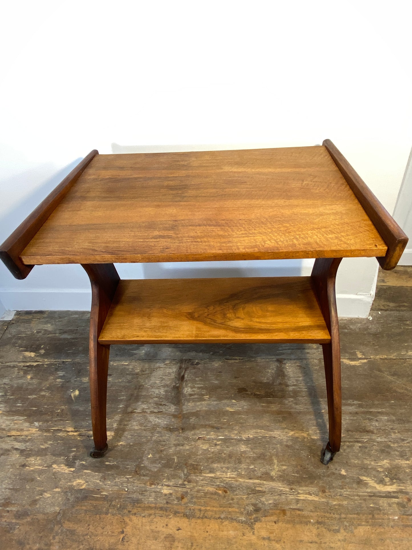 Vintage 1950s Mid-Century Modern Side Table on Casters – Sculptural Solid Wood Design